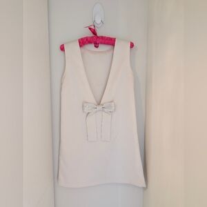 Elegant Cream Sleeveless Dress with Bow